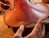 A violin being repaired