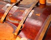 A violin being repaired
